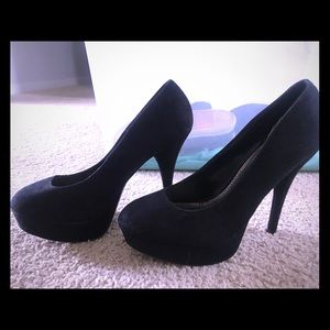Black suede pumps